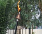 Automated Copper Cone Head Tiki with Black Pole (image for) Automated Copper Cone Head Tiki with Black Pole